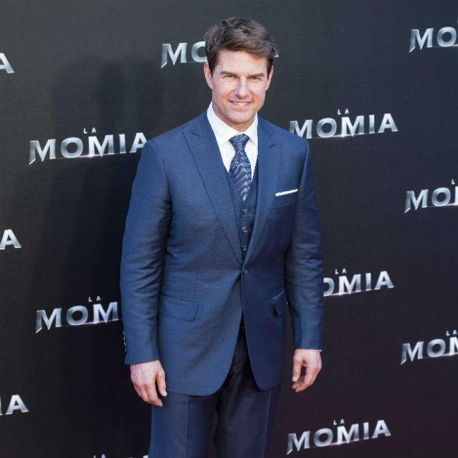 Tom Cruise surprises fans by sneaking into Tenet screening