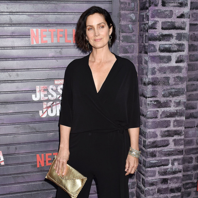 Carrie-Anne Moss cast in Die Alone